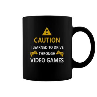 Caution I Learned To Drive Through Video Games Funny Coffee Mug | Mazezy