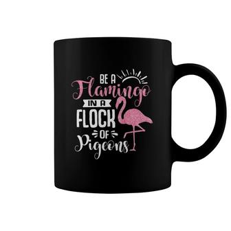 Flamingo In A Flock Of Pigeons Coffee Mug | Mazezy