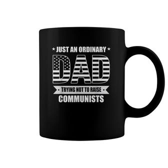 Just An Ordinary Dad Trying Not To Raise Communists Coffee Mug | Mazezy
