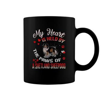 My Heart Is Held By The Paws Of A Shetland Sheepdog Coffee Mug | Mazezy