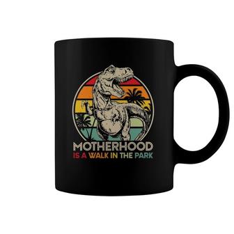 Vintage Motherhood Is A Walk In The Park Mama Mommy Dinosaur Coffee Mug | Mazezy