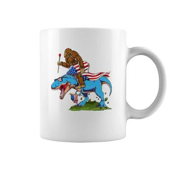 Bigfoot Riding Dinosaur Usa Flag 4Th Of July America Coffee Mug | Mazezy