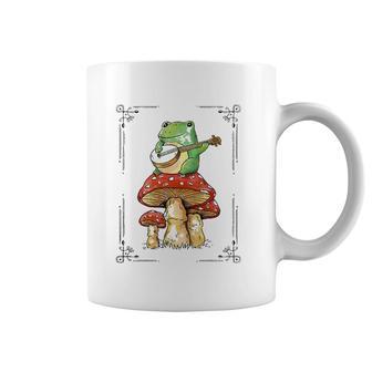 Funny Cottagecore Aesthetic Frog Playing Banjo On Mushroom Coffee Mug | Mazezy