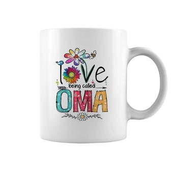 I Love Being Called Oma Daisy Flower Cute Mother's Day Raglan Baseball Tee Coffee Mug | Mazezy