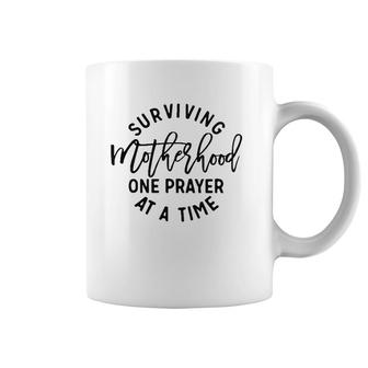 Surviving Motherhood One Prayer At A Time Coffee Mug | Mazezy