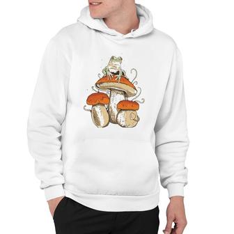 Frog Sitting On Mushroom Cute Cottagecore Nature Graphic Hoodie | Mazezy