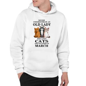 Never Underestimate An Old Lady Who Loves Cats Born In March Hoodie | Mazezy