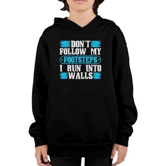 Don't Follow My Footsteps I Run Into Walls Funny Sarcastic Youth Hoodie | Mazezy