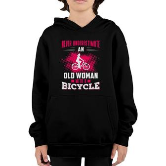 Never Underestimate An Old Woman With A Bicycle Pink Youth Hoodie | Mazezy