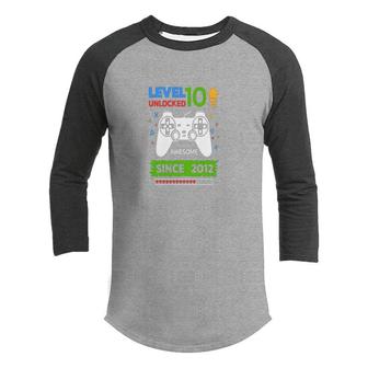 10Th Birthday 10 Years Old Since 2012 Level 10 Unlocked Video Game Youth Raglan Shirt - Seseable