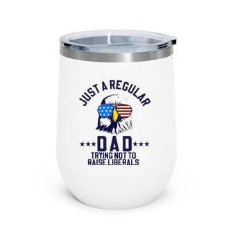 Just A Regular Dad Trying Not To Raise Liberals Funny Gift Wine Tumbler | Mazezy
