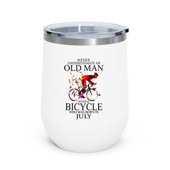 Never Underestimate An Old Man With A Bicycle Who Was Born In July Wine Tumbler | Mazezy
