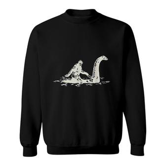 Bigfoot Riding The Loch Ness Monster Funny Sweatshirt | Mazezy