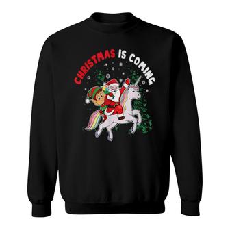 Christmas Is Coming Santa Clause Elf Riding A Unicorn Sweatshirt | Mazezy