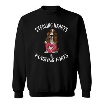 Stealing Hearts Blasting Farts Basset Hound Valentine's Day Sweatshirt | Mazezy