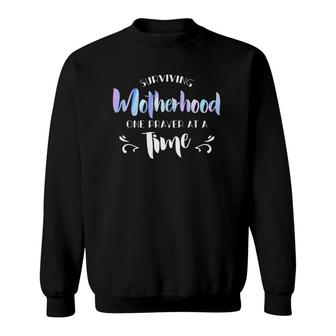 Surviving Motherhood One Prayer At A Time Funny Saying Premium Sweatshirt | Mazezy