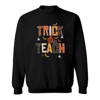 Trick Or Teach Cute Halloween Teacher Sweatshirt | Mazezy