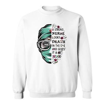 A Strong Nurse Looks Death In The Eye And Gives It A Wink Red Cross Personal Protective Equipment Flowers Sweatshirt | Mazezy DE