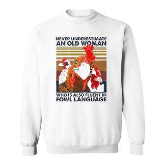 Womens Never Underestimate An Old Woman Who Is Also Fluent In Fowl Sweatshirt | Mazezy