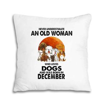 Never Underestimate An Old Woman Who Loves Dogs December Pillow | Mazezy