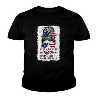Funny Just A Badass Mom Trying Not To Raise Liberals Youth T-shirt | Mazezy