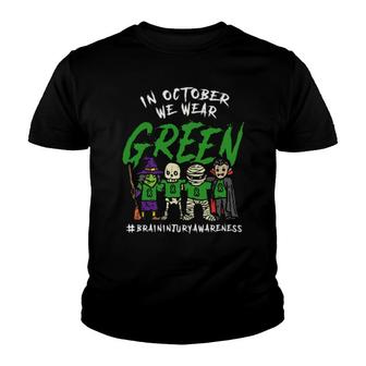 In October We Wear Green For Brain Injury Awareness Halloweeen Youth T-shirt | Mazezy