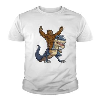 Bigfoot Sasquatch Riding Dinosaur T Rex Youth T-shirt | Mazezy