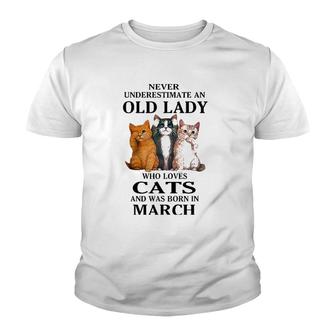 Never Underestimate An Old Lady Who Loves Cats Born In March Youth T-shirt | Mazezy