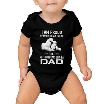 Father's Day I Am Proud Of Many Things In Life But Nothing Beats Being A Dad Baby Onesie | Mazezy