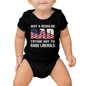 Mens Just A Regular Dad Trying Not To Raise Liberals Fathers Baby Onesie | Mazezy