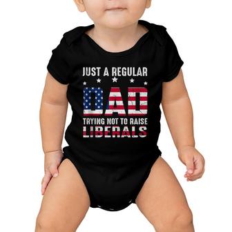 Vintage Just A Regular Dad Trying Not To Raise Liberals Baby Onesie | Mazezy