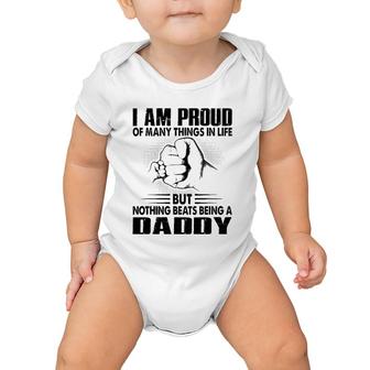 Proud Of Many Things In Life But Nothing Beats Being A Dad Baby Onesie | Mazezy