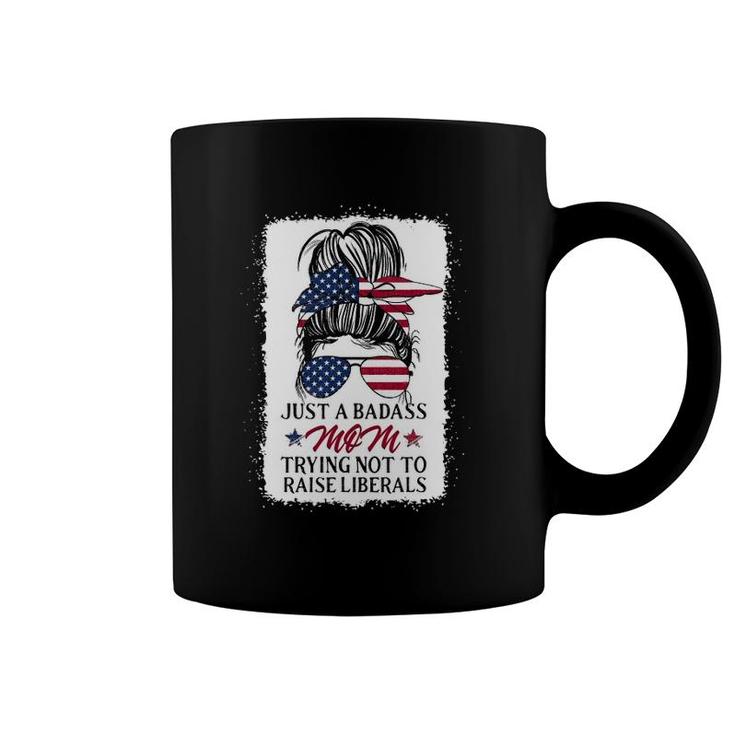 Funny Just A Badass Mom Trying Not To Raise Liberals Coffee Mug