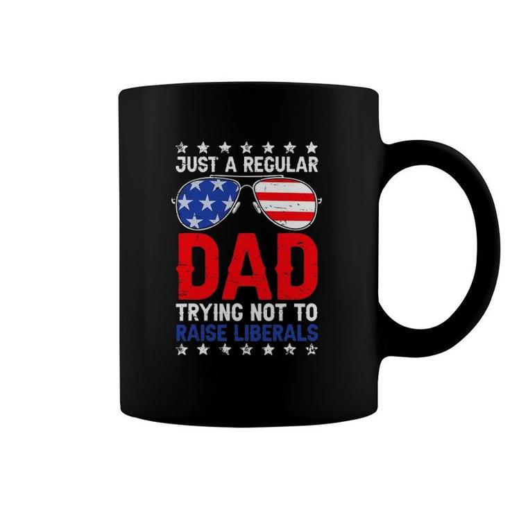 Just A Regular Dad Trying Not To Raise Liberals Voted Trump Coffee Mug