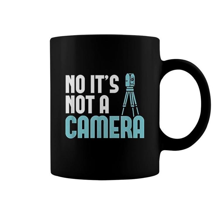 No Its Not A Camera Land Surveying Coffee Mug