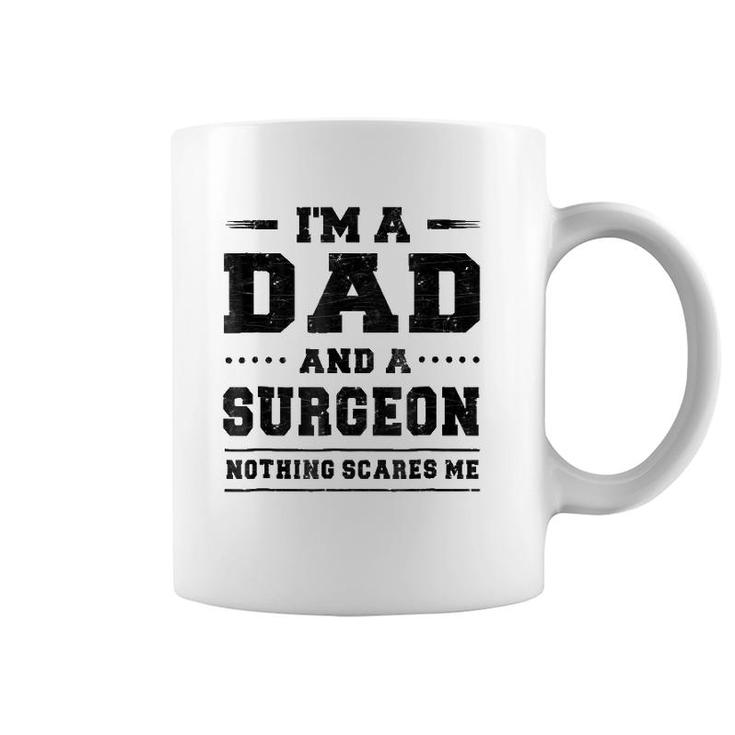 Mens I'm A Dad And A Surgeon Nothing Scares Me Coffee Mug