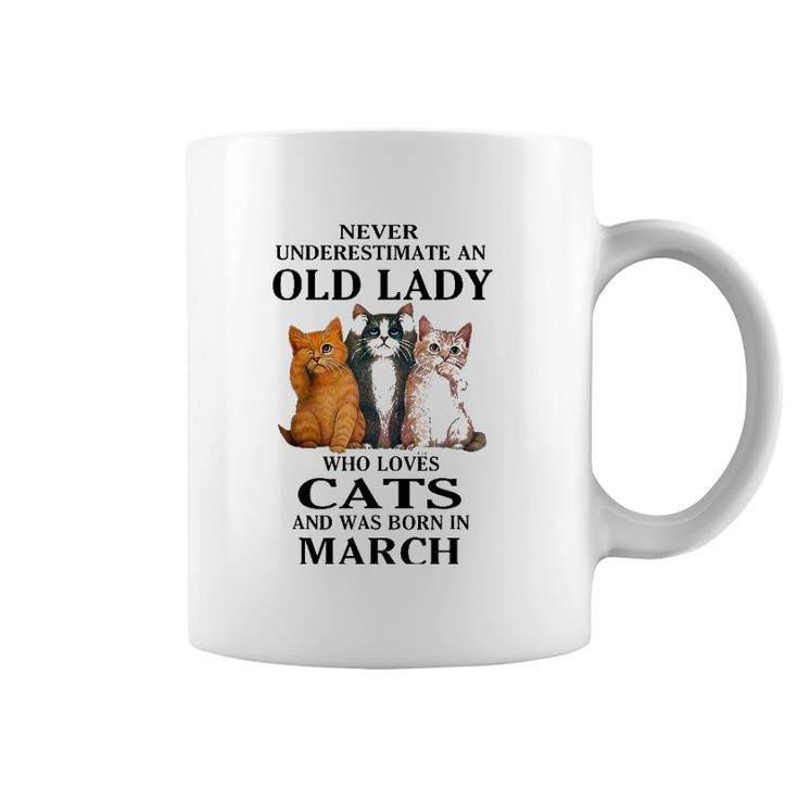 Never Underestimate An Old Lady Who Loves Cats Born In March Coffee Mug