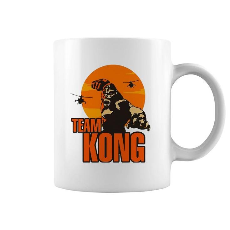 Team Kong Taking Over The City And Helicopters Sunset Coffee Mug