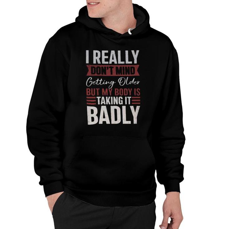 I Really Don't Mind Getting Older But My Body Is Taking It Badly Hoodie