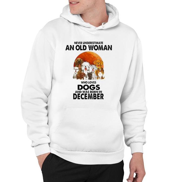 Never Underestimate An Old Woman Who Loves Dogs December Hoodie