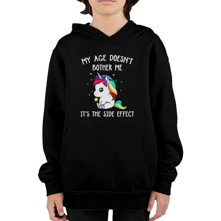 Magical Unicorn My Age Doesn't Bother Me It's The Side Effect Youth Hoodie