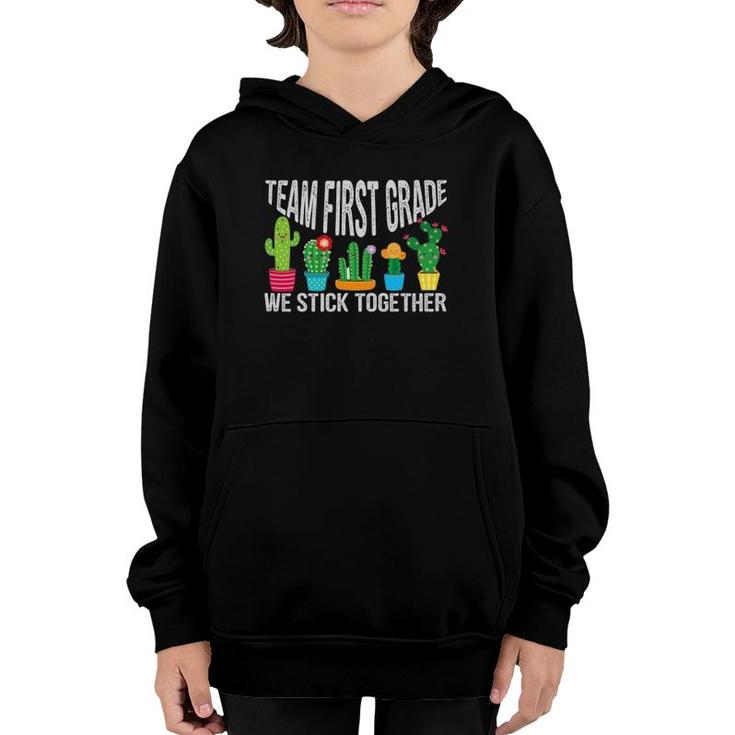 Team First Grade We Stick Together  Cactus Teacher Youth Hoodie
