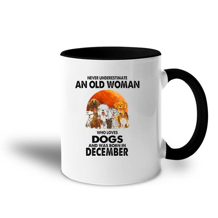 Never Underestimate An Old Woman Who Loves Dogs December Accent Mug