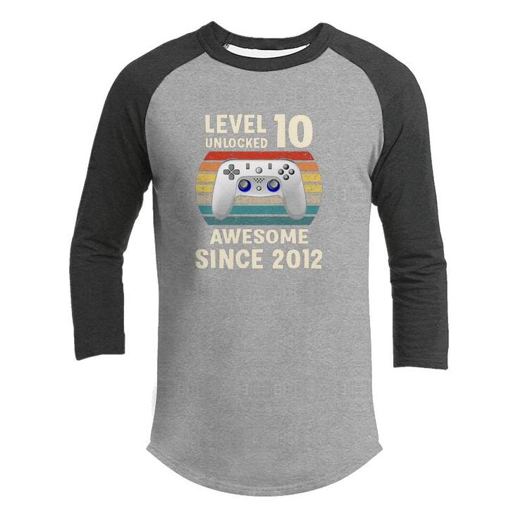 10Th Birthday 10 Years Old Vintage Gmaer Level 10 Unlocked Awesome Since 2012 Youth Raglan Shirt