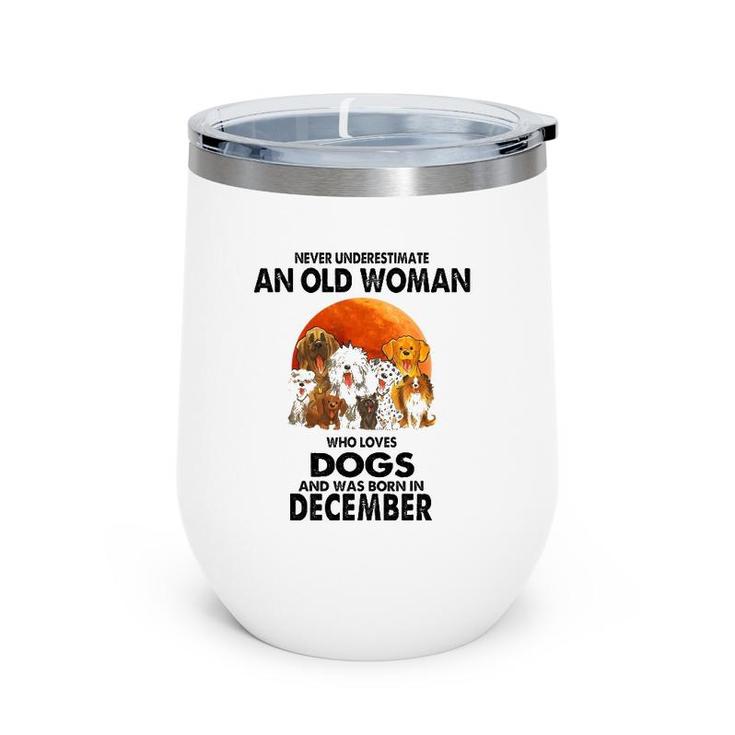 Never Underestimate An Old Woman Who Loves Dogs December Wine Tumbler