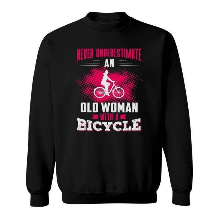 Never Underestimate An Old Woman With A Bicycle Pink Sweatshirt
