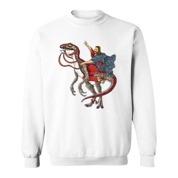 Jesus Riding A Dinosaur  Raptor Dinosaur Parody Sweatshirt