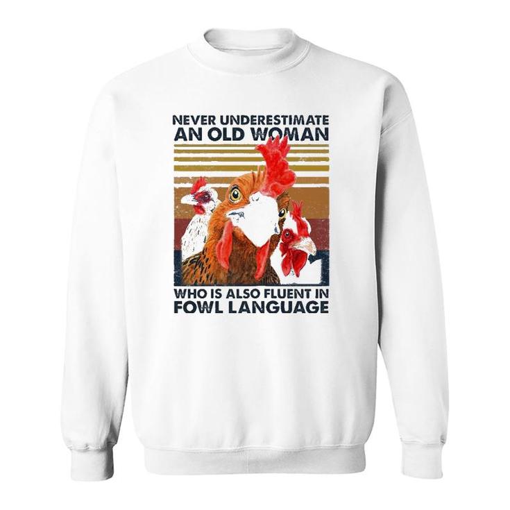 Womens Never Underestimate An Old Woman Who Is Also Fluent In Fowl Sweatshirt