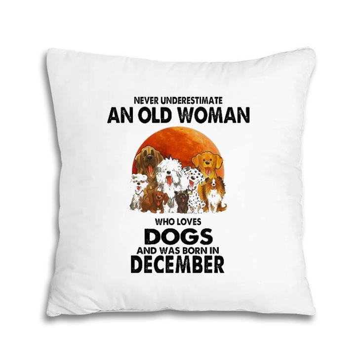 Never Underestimate An Old Woman Who Loves Dogs December Pillow