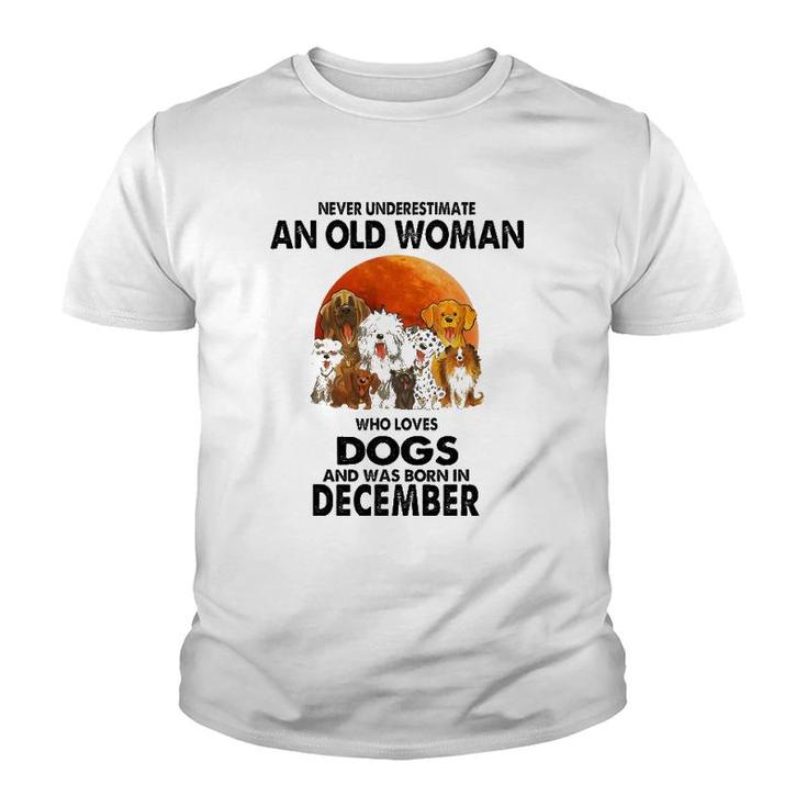 Never Underestimate An Old Woman Who Loves Dogs December Youth T-shirt